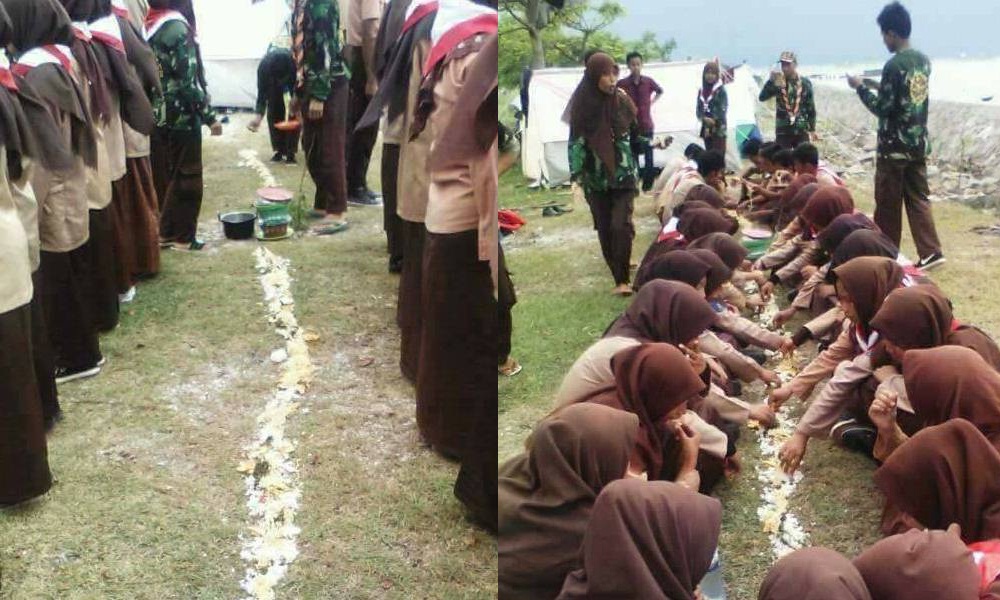 Anggota Pramuka Makan Beralaskan Tanah