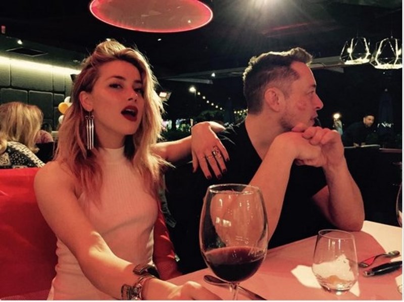 Move On dari Johnny Depp Amber Heard Gandeng Miliuner Ini