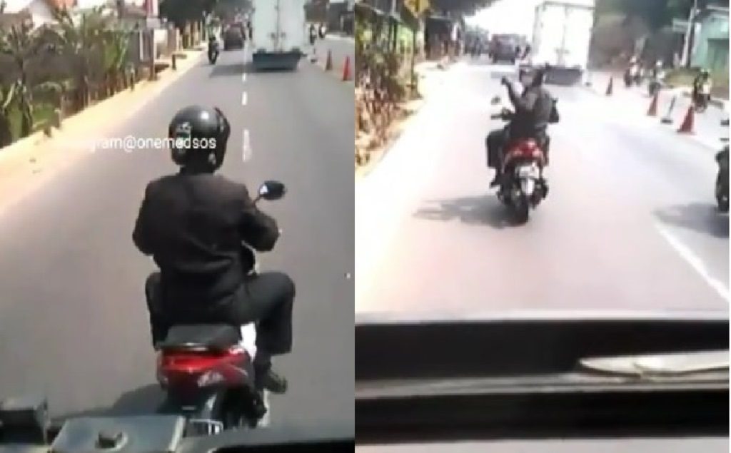 Bikin Kesel Pengendara Motor ini Lakukan Aksi Berbahaya di Depan Bus yang Berjalan