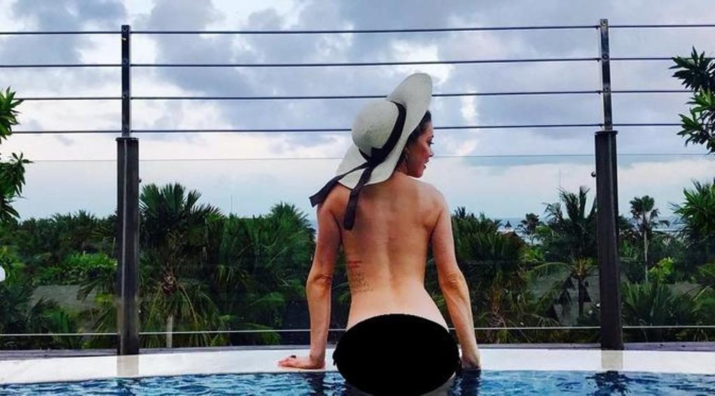 Netizen Heboh Liburan di Bali Amber Heard Pamer Foto Topless