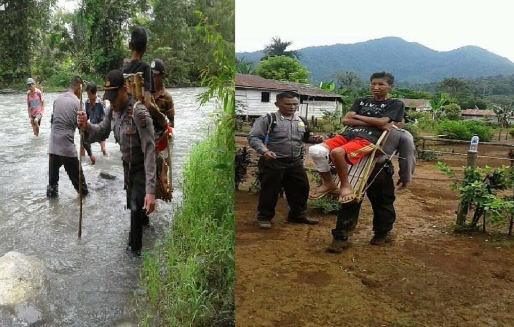 Aksi Heroik Kapolsek Bunta Gendong Warga yang Sakit Sambil Jalan Kaki 5 Km Sebrangi Sungai ini Tuai Pujian