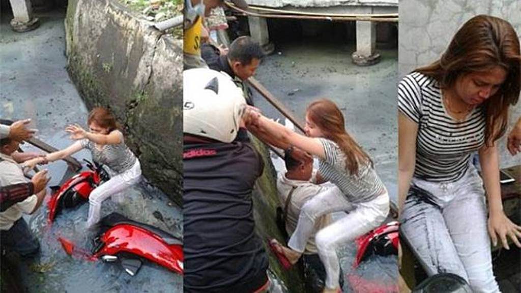 Hebohkan Warga di Siang Bolong Para Pria Mendadak Turun ke Got Ternyata Tolong Wanita Ini