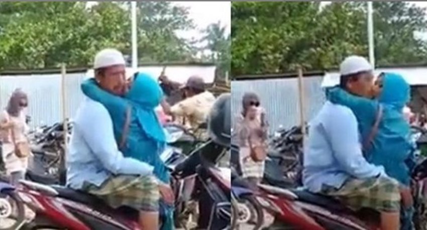 Serasa Dunia Milik Berdua Pasangan Ibu dan Bapak ini Asyik Bermesraan di Atas Motor