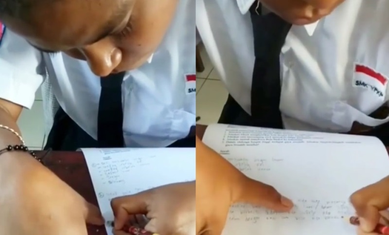 Anti Mainstream Pelajar Ini Menulis dengan Posisi Kertas Terbalik