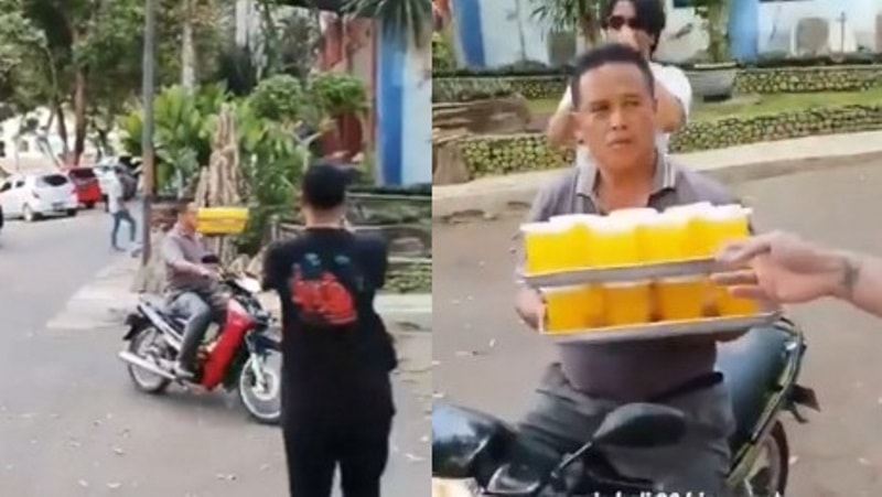 Punya Skill Mumpuni Saat Bawa Pesanan Pelanggan Penjual Minuman Keliling Curi Perhatian Warganet