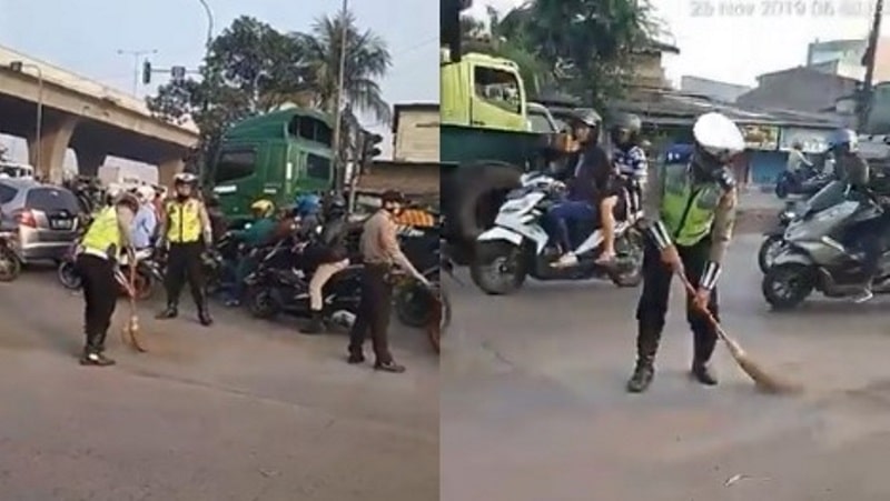 VIRAL Polisi Nyapu Jalanan yang Kotor Penuh Pasir Aksinya Tuai Pujian