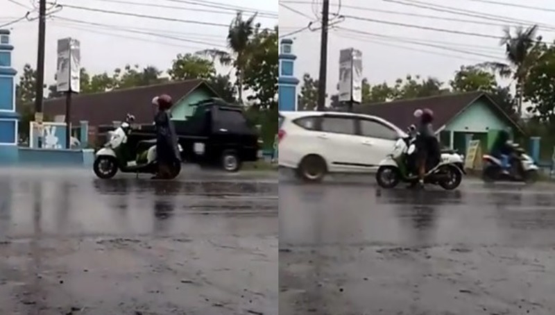Emak emak Raja Jalanan Tetap Santuy Pakai Jas Hujan Meski di Tengah Jalan Raya