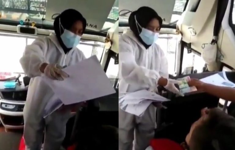 VIRAL Wanita Berbaju APD Diduga Jual Surat Bebas Covid 19 di Bus Segini Tarifnya