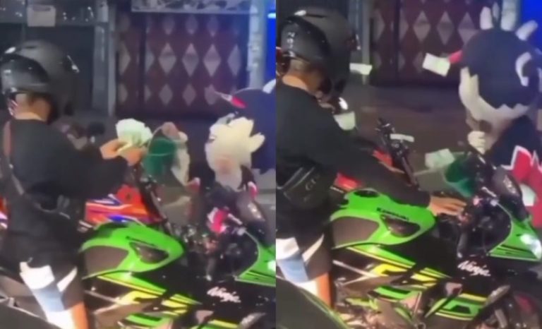 Viral Aksi Pemotor Lempar Segepok Uang ke Badut Jalanan Gak Sopan