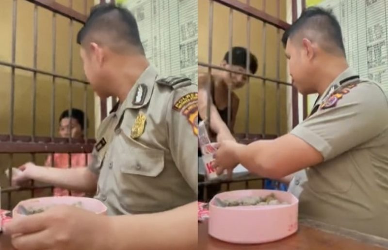 Baik Banget Polisi ini Mau Berbagi Makanan dengan Tahanan Penjara