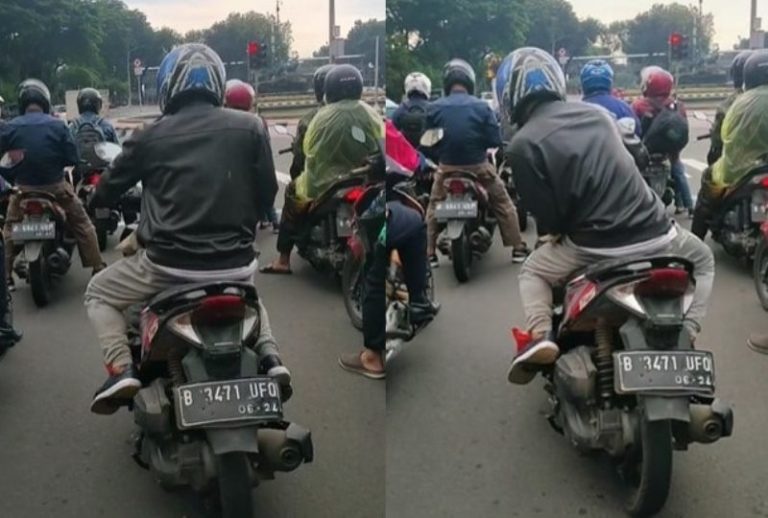 VIRAL Aksi Pengendara Motor Ogah Turun Kaki Saat Berhenti di Lampu Merah Sakti