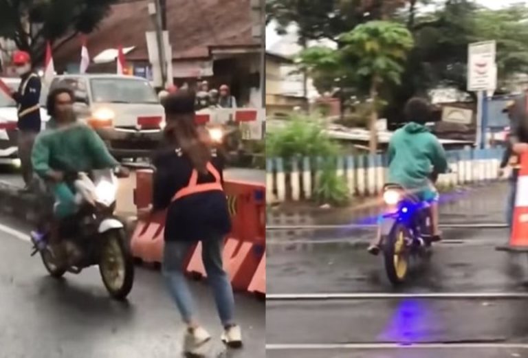 Pemotor Ngotot Terobos Rel Kereta Sampai Nyaris Tabrak Petugas yang Menghadang