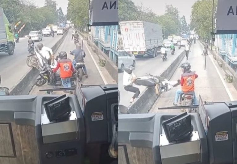 Takut Ditilang Pengendara Nekat Angkat Motor Agar Keluar dari Jalur Transjakarta