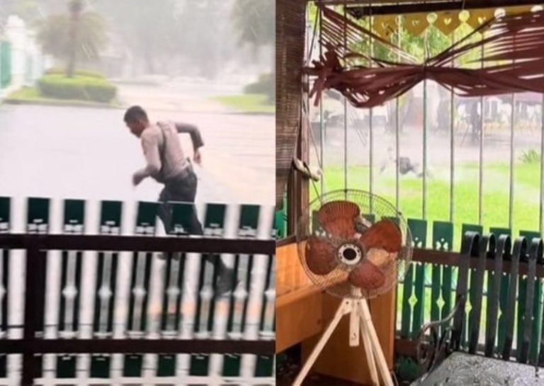 Apes Pak Polisi Nekat Lari di Tengah Hujan Deras Endingnya Berenang di Kubangan Air