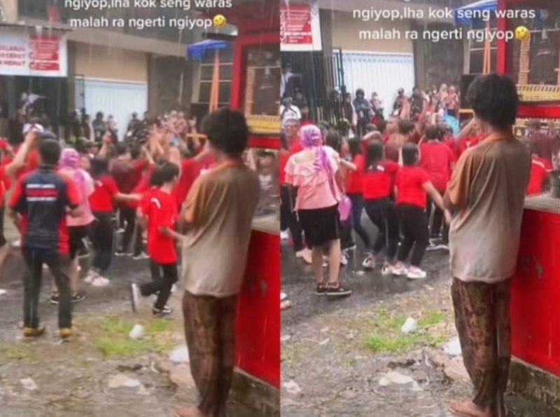 ODGJ Pilih Berteduh Sambil Lihat Orang Waras yang Malah Joget Saat Hujan Heran