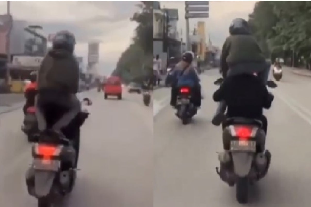 Aksi Remaja Nekat Duduk di Bahu Temannya yang Sedang Kendarai Motor